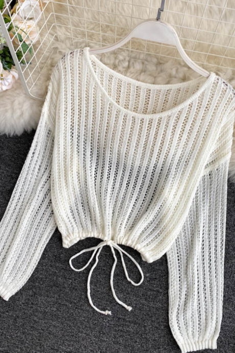 Thin cut-out knitted top